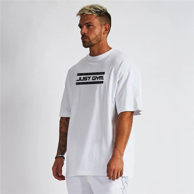 Men's five-point sleeve bodybuilding sports T-shirt in cotton, round neck, black colour, front view