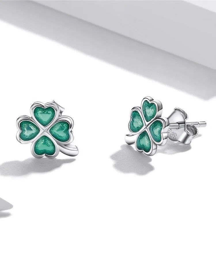 White gold plated textured green dripping lucky stud earrings with four-leaf clover design on 925 silver