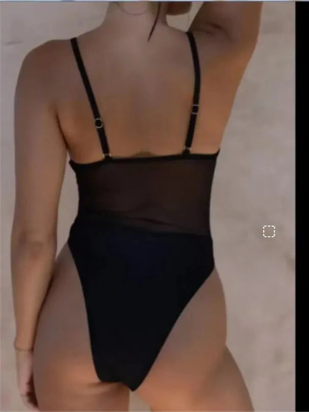 Black women's one-piece swimsuit with banded bikini styling on mannequin