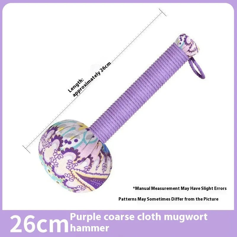 Argy wormwood massage hammer in green colour showing hand-held design for neck and shoulder massage