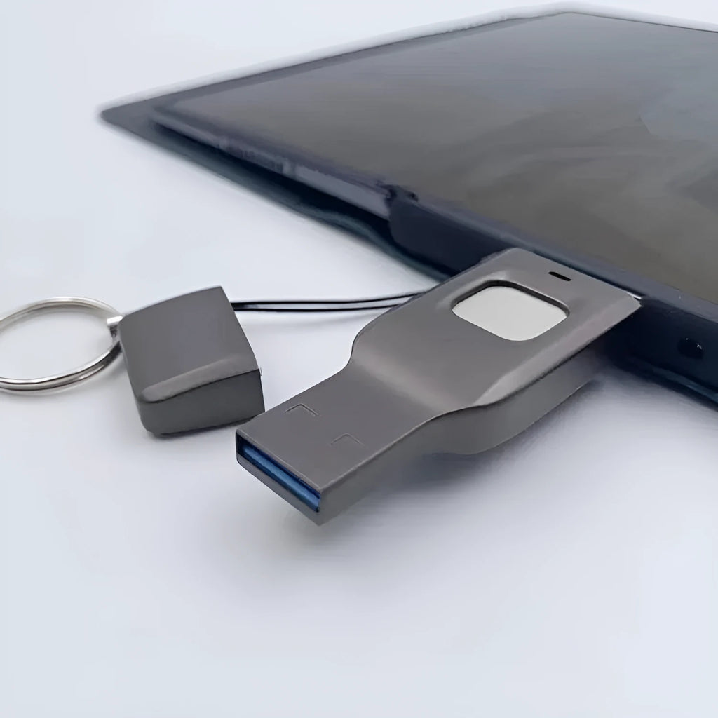 Black metal fingerprint encrypted USB flash drive with USB 3.0 and USB-C connectors.