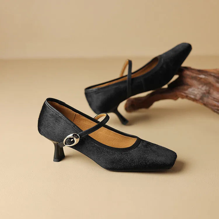 Women's black square toe stiletto ankle-strap shoes with a textured horse hair upper.