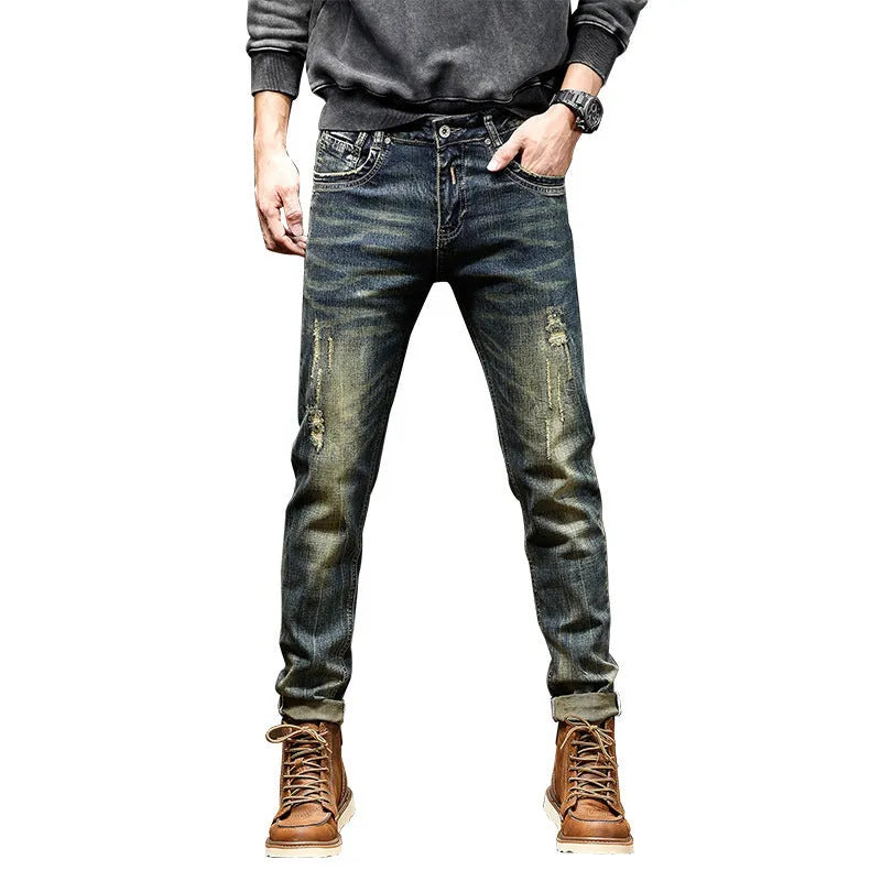 Men's skinny fit stretch jeans in a retro colour, showing zip fly and cotton denim fabric.