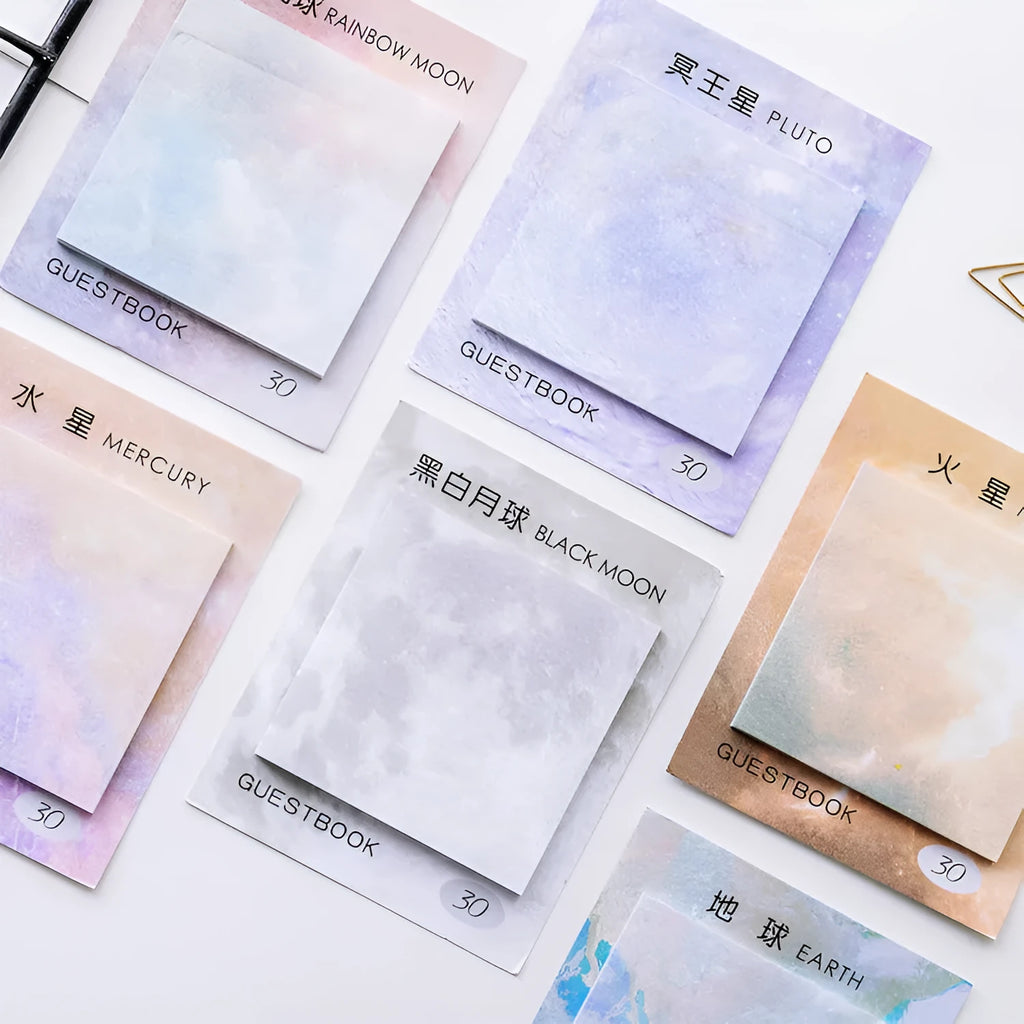 Square planet-themed sticky notes notepad showing oil painting designs of moon, earth, and mars