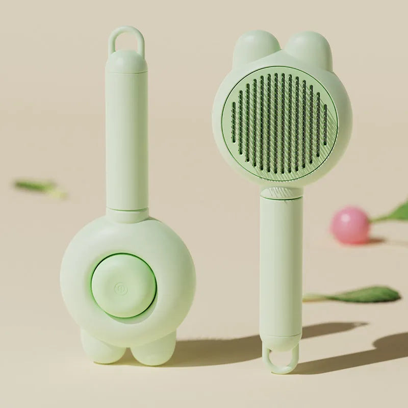 Self-cleaning pet grooming brush with release button in four colour options