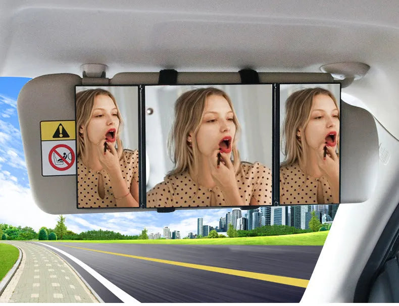 Silver car folding makeup mirror shown closed at 15.5cm and open at 30.5cm wide.