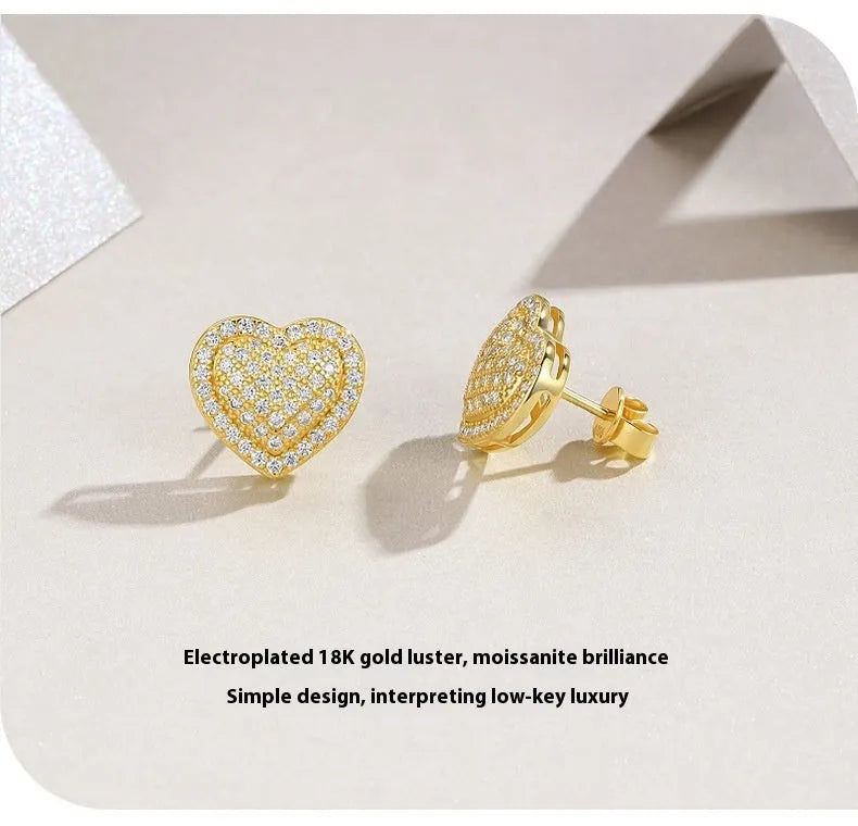 Gold-plated S925 silver stud earrings with a heart-shaped moissanite stone.