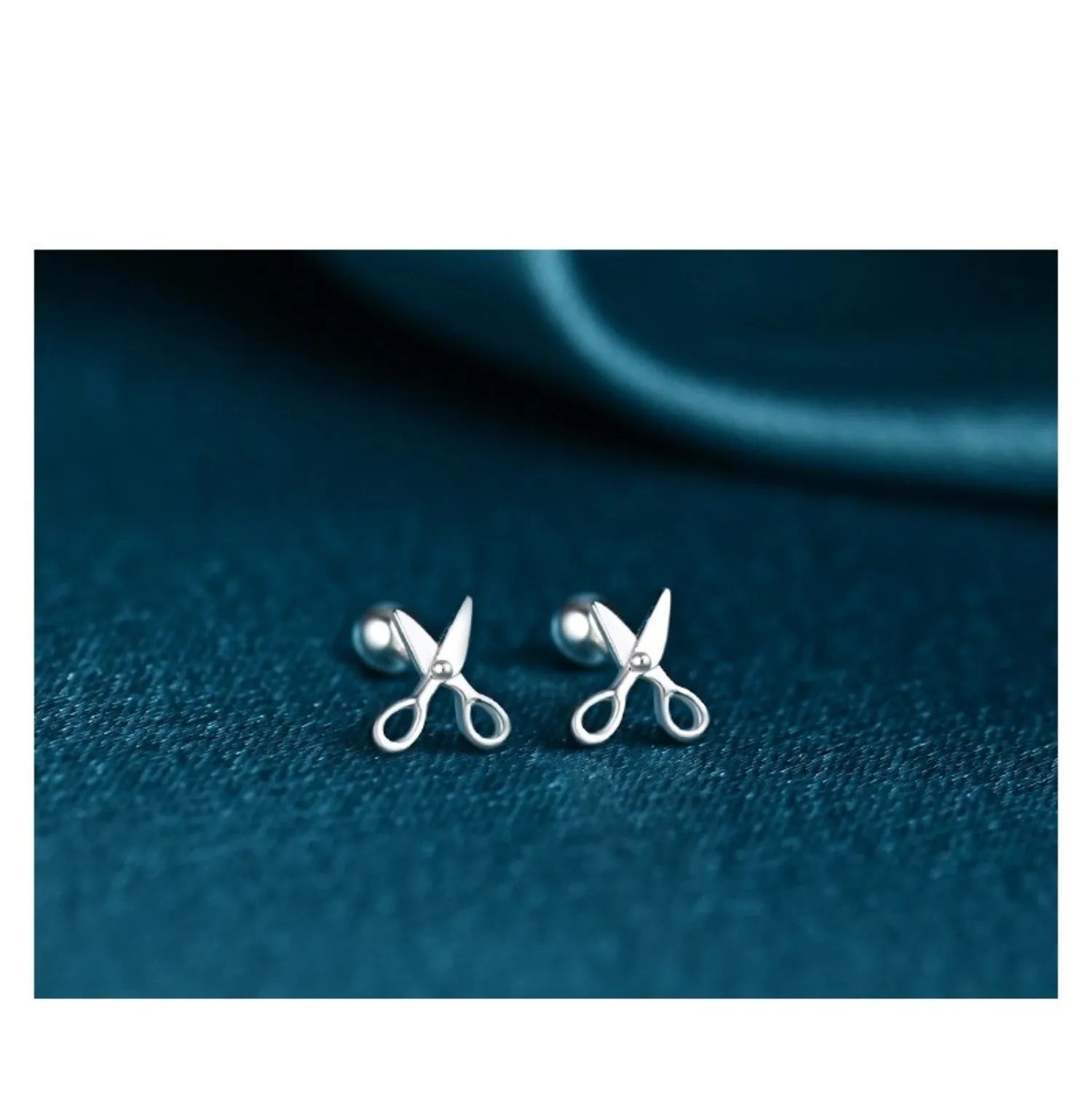 Silver ear studs with screw fastening and miniature scissors design