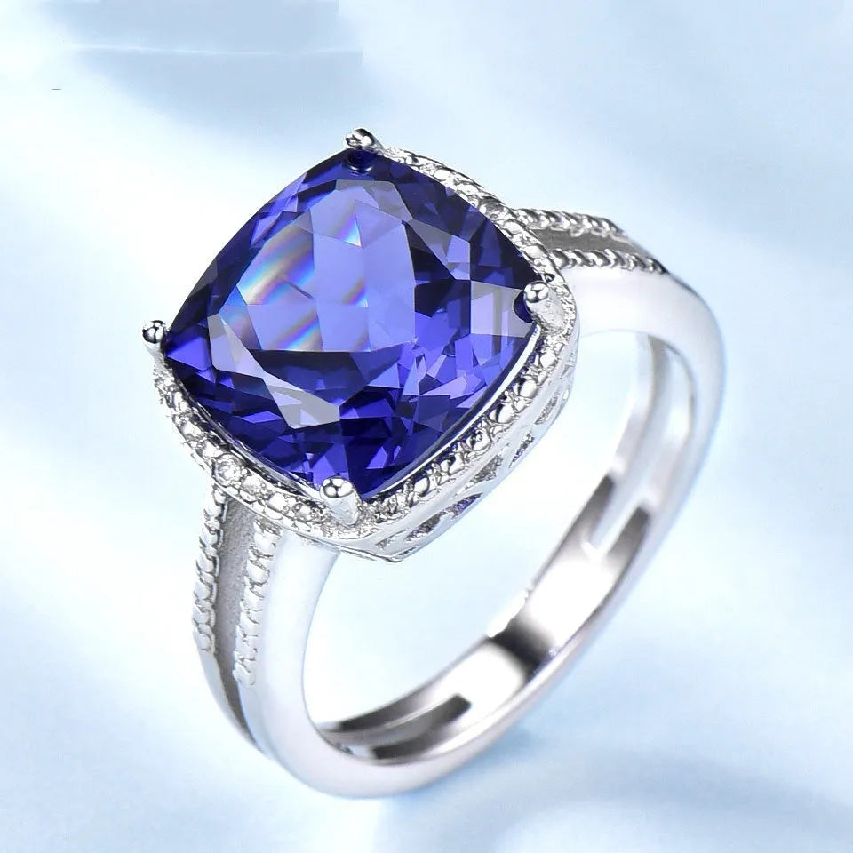 Women's sterling silver 925 ring with a blue tanzanite gemstone centrepiece.