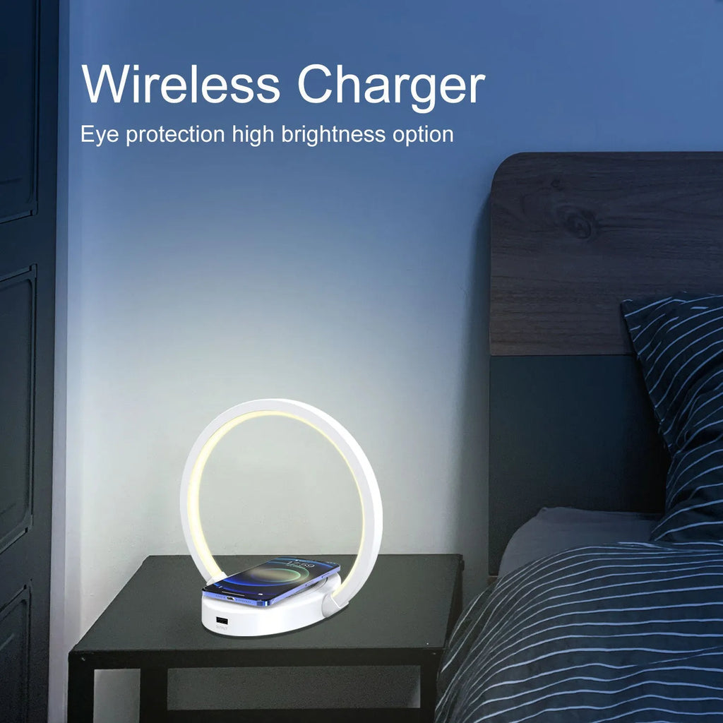 Wood grain wireless charging lamp with Bluetooth speaker, 10W charger, USB port, and phone holder on a desk