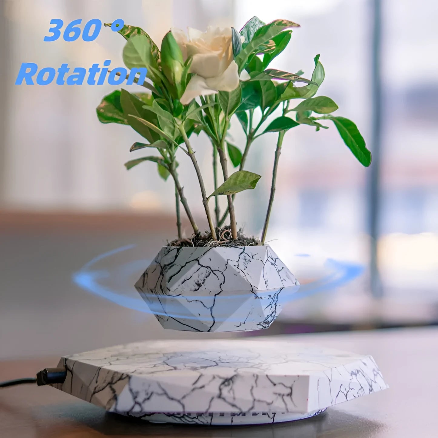 Marbled colour levitating plant pot floating above base with magnetic technology