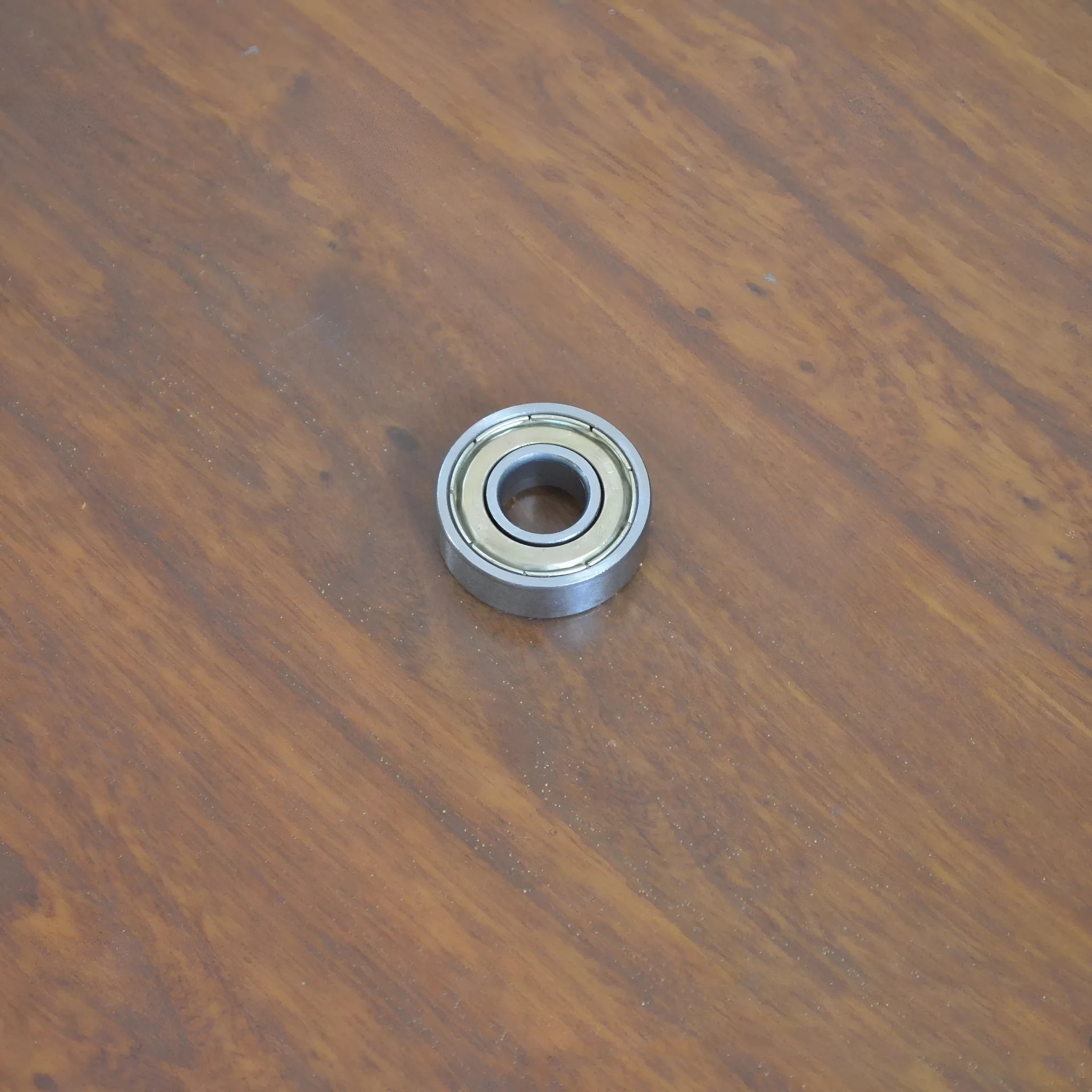 6000zz deep groove ball bearing with carbon steel construction and 10mm inner diameter, 26mm outer diameter.