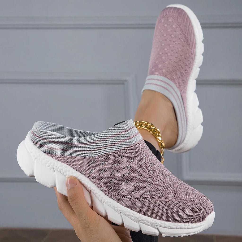 Women's black striped Flyknit slipper shoes with a height-increasing sole on a plain background