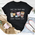 Plain black loose-fit cotton T-shirt with short sleeves and a round neck.
