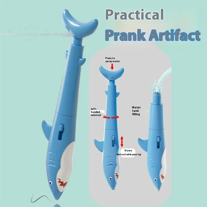 Shark water gun pen in blue plastic with press mechanism for water spray, on white background