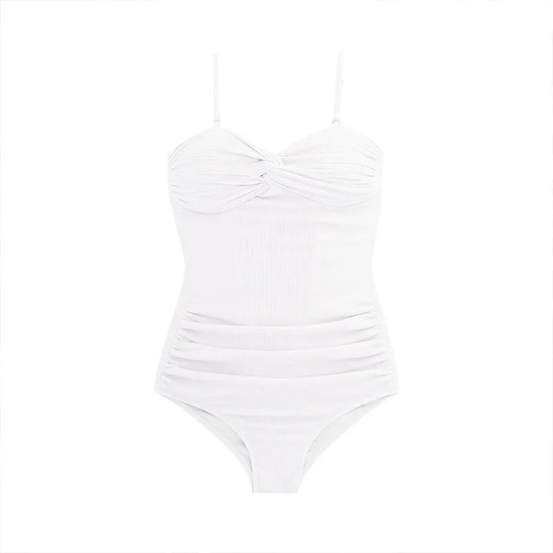 Women's black one-piece swimsuit with suspender straps and a high-waist design on a model.