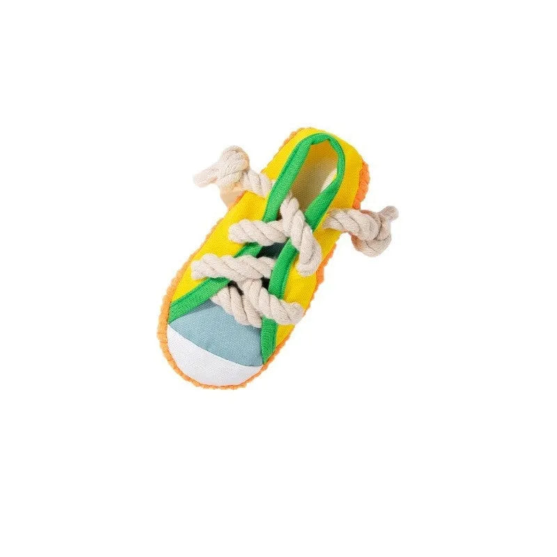 Plastic dog slippers toy with sound mechanism in yellow, black, or blue colours for chewing and interactive play