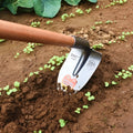 Agricultural pointed hoe tool with manganese steel edge and stainless steel construction