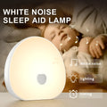 White rechargeable baby night feeding comforter with music function on a neutral background