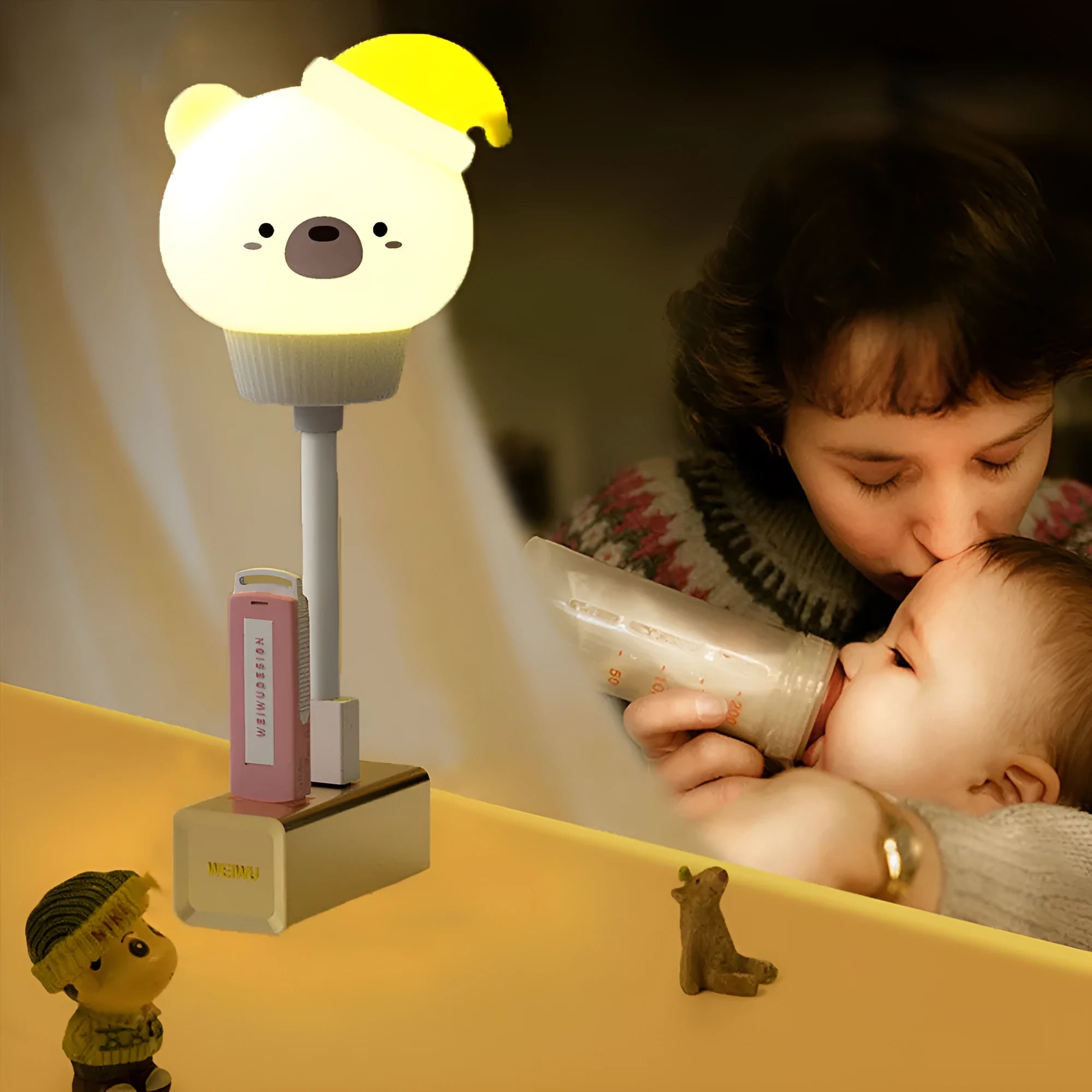 Cartoon animal USB portable LED night light with remote control on a bedside table.