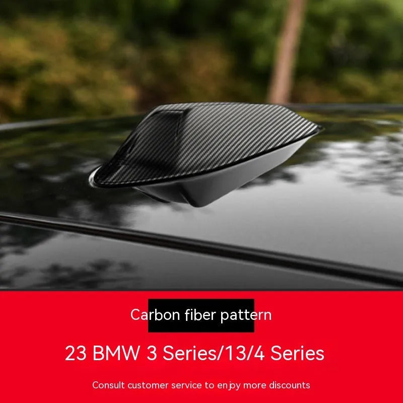 BMW shark fin antenna cover in carbon fibre pattern and piano black finishes
