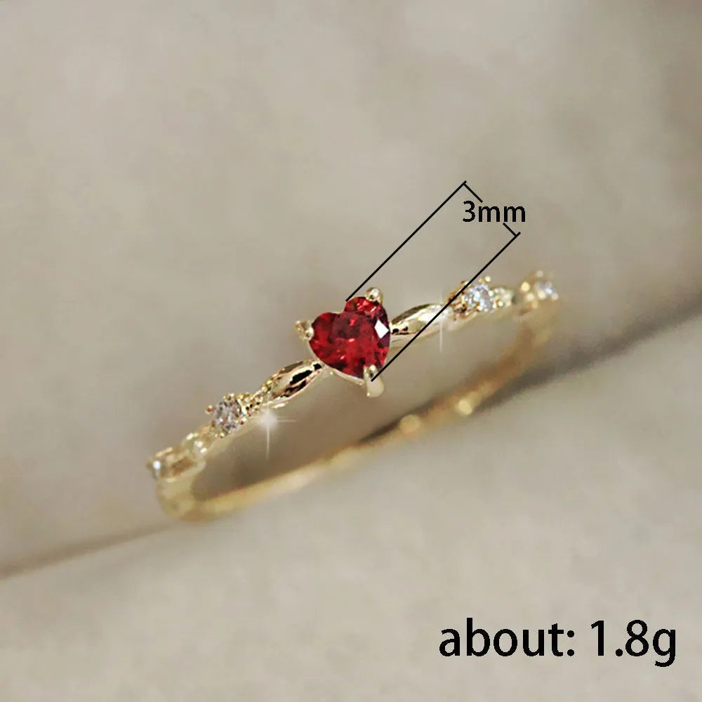 Gold or silver electroplated peach heart ring with zircon detailing on copper base