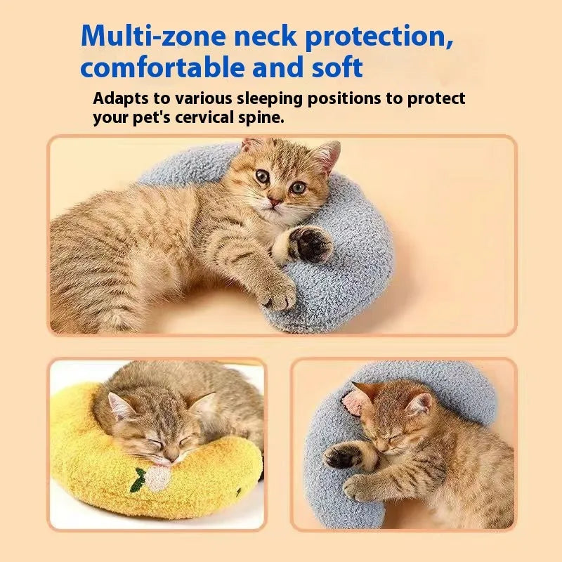 Blue and yellow U-shaped cloth pillows for cat neck support in moon and question mark designs.