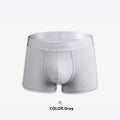 Men's solid colour cotton boxer shorts in black, white, silver grey, and light green.
