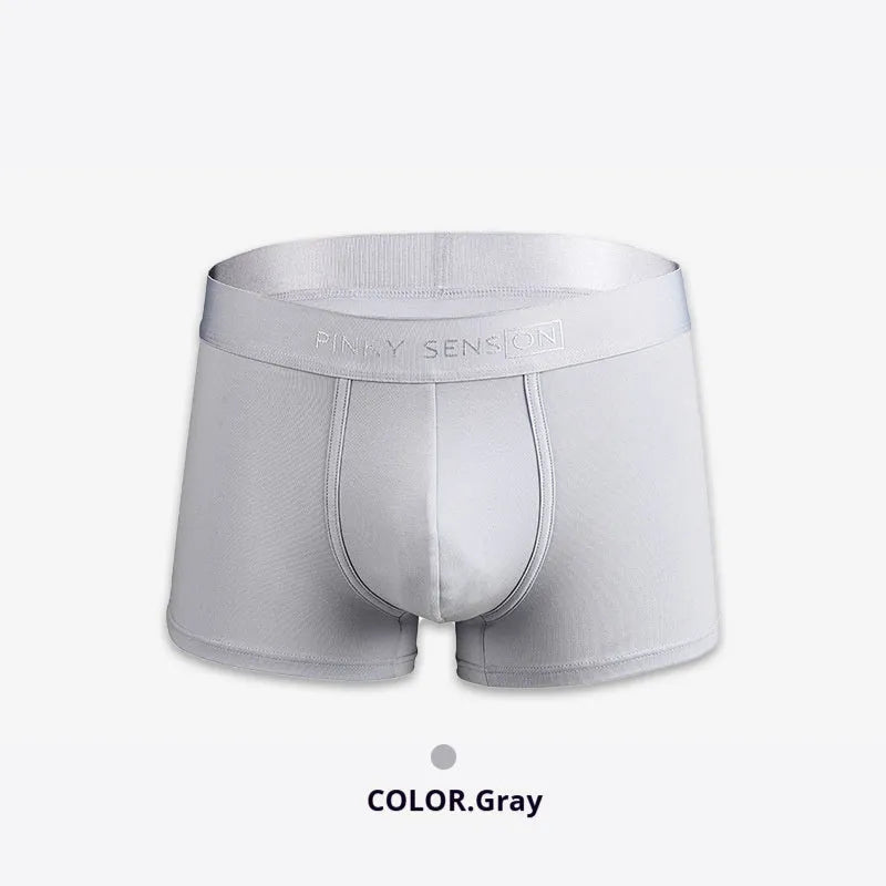Men's solid colour cotton boxer shorts in black, white, silver grey, and light green.