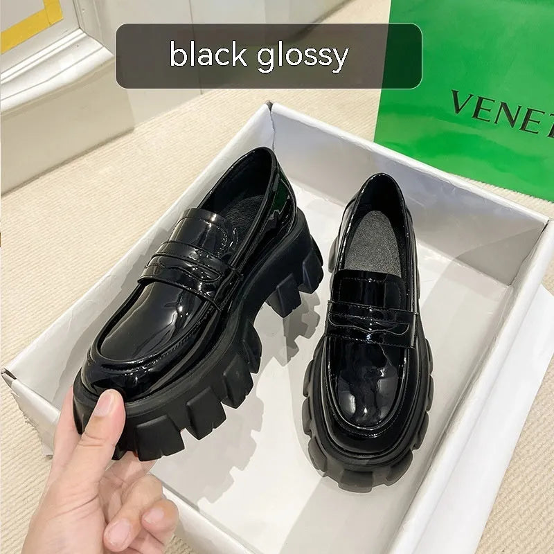British style wide fit loafers in either matte or patent leather with distinctive muffin heel