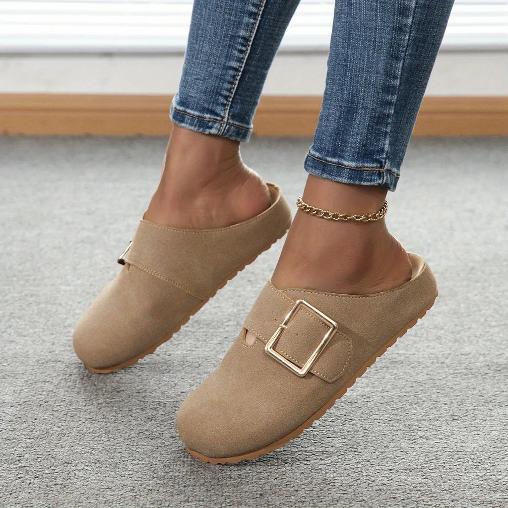 Women's closed toe canvas slippers in apricot colour showing low top design and canvas upper material