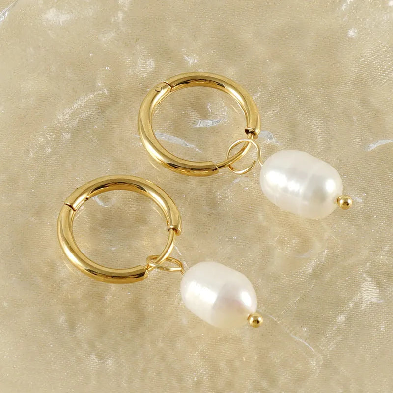 Gold geometric pearl earrings made from stainless steel with titanium steel components
