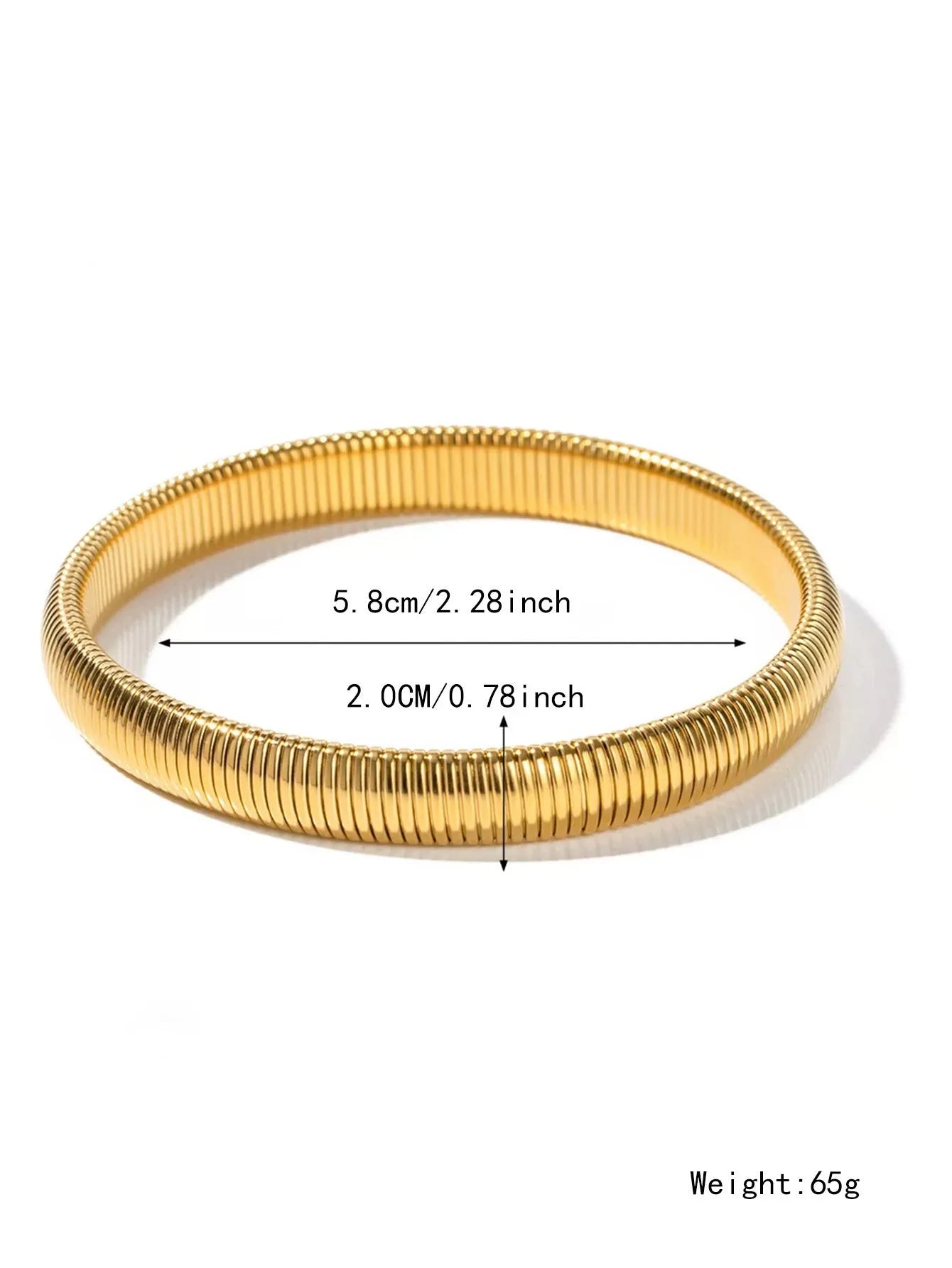 Women's gold titanium steel bracelet with exaggerated vertical stripe ring elastic pattern, showing width options.