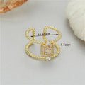 Adjustable open ring with asymmetric U-shape design in 14K gold-plated copper, colour H-12813.