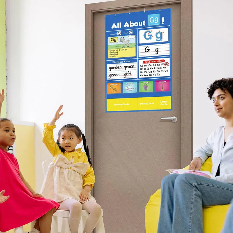 Alphabet learning chart with word cards, letter cards, and picture cards displayed on a 60cm by 40cm sleeve table.