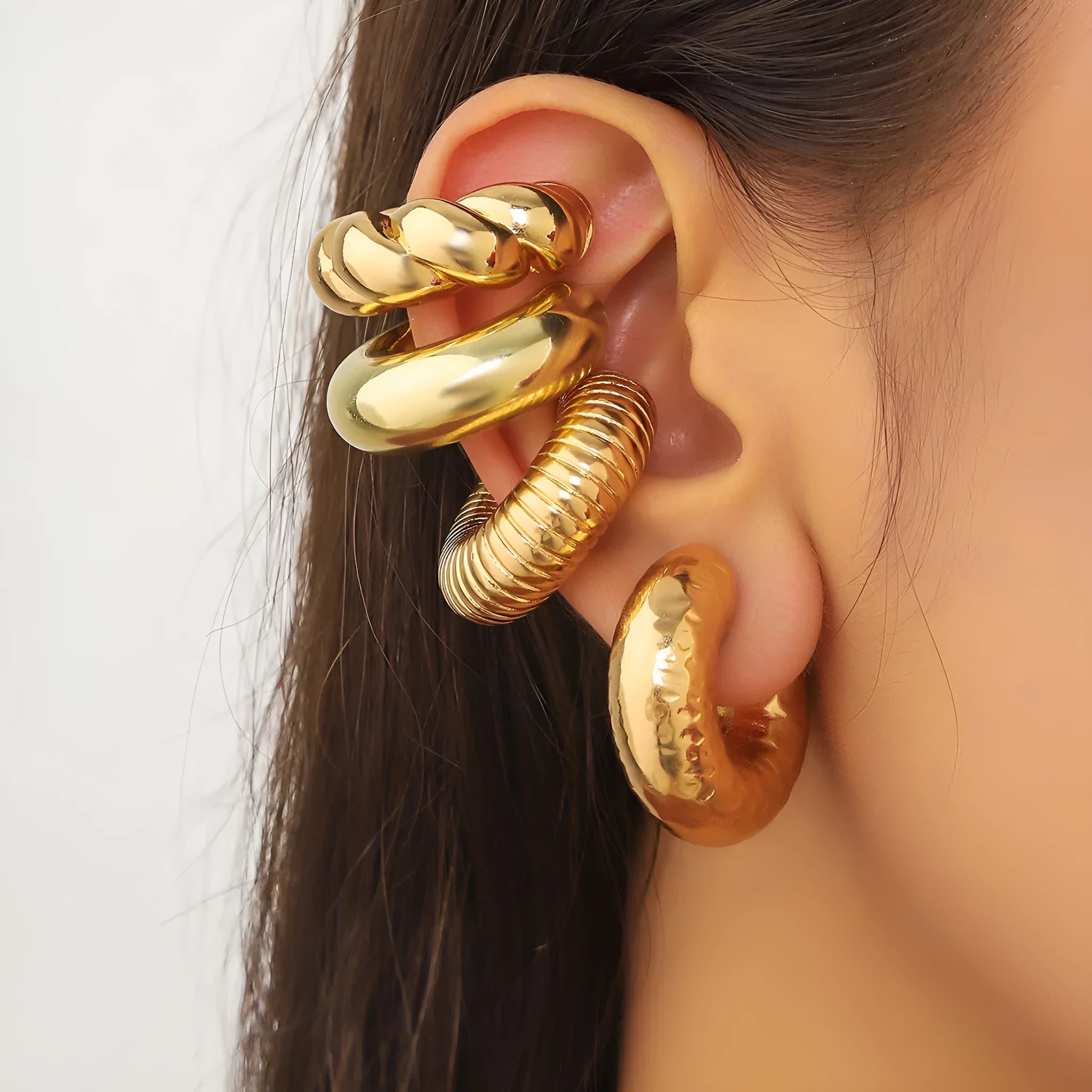 Geometric non-pierced ear clip earrings for women in gold and silver metallic finishes