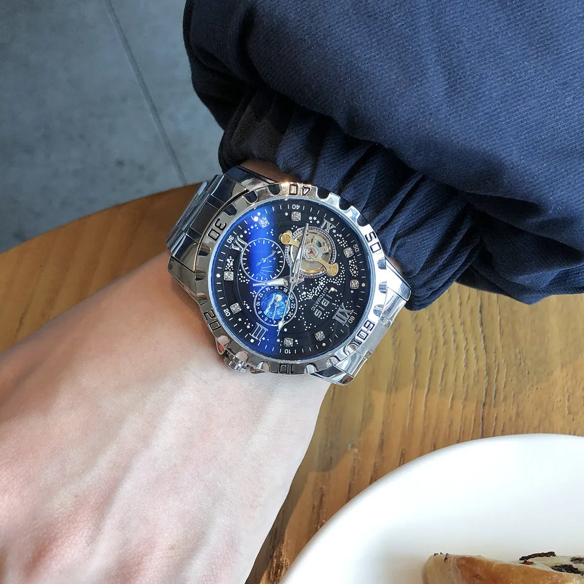 Men's silver case automatic mechanical watch with black starry dial on genuine leather strap