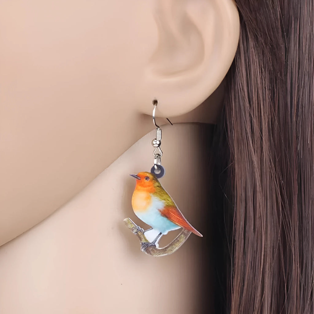 Blue titmouse pendant drop earrings with geometric animal zodiac snake designs printed on acrylic