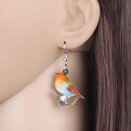 Blue titmouse pendant drop earrings with geometric animal zodiac snake designs printed on acrylic