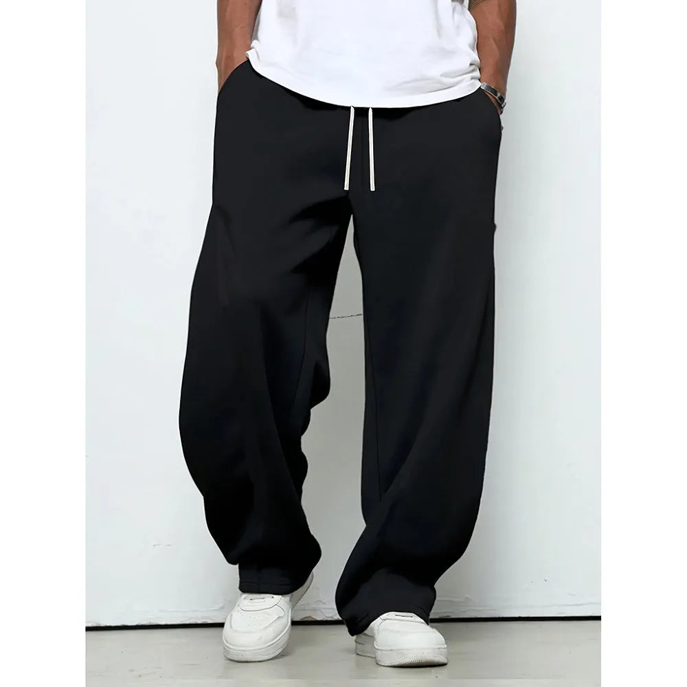 Men's solid colour casual trousers with a micro-elastic waistband and straight-leg cut.