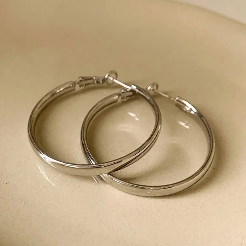40mm circular copper earrings with electroplated gold or silver finish