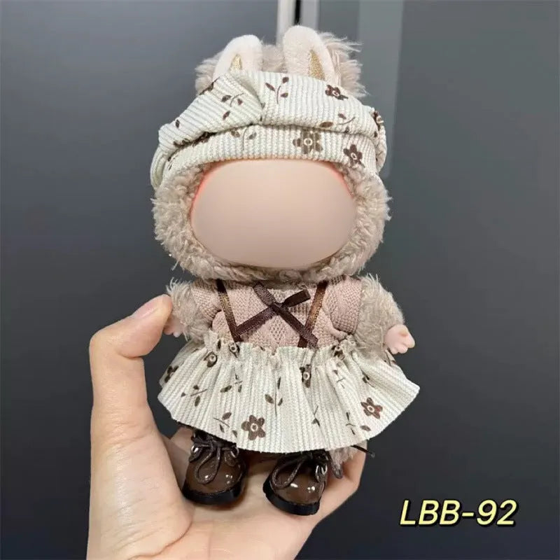 Plastic clothing outfit for a 17cm tall collectible vinyl figurine doll.