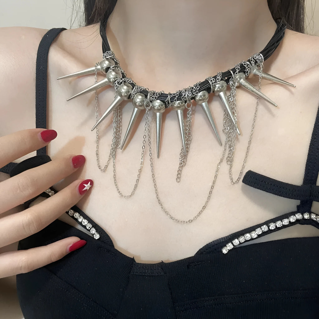Women's leather winding tassel necklace with round beads and silver rivet details