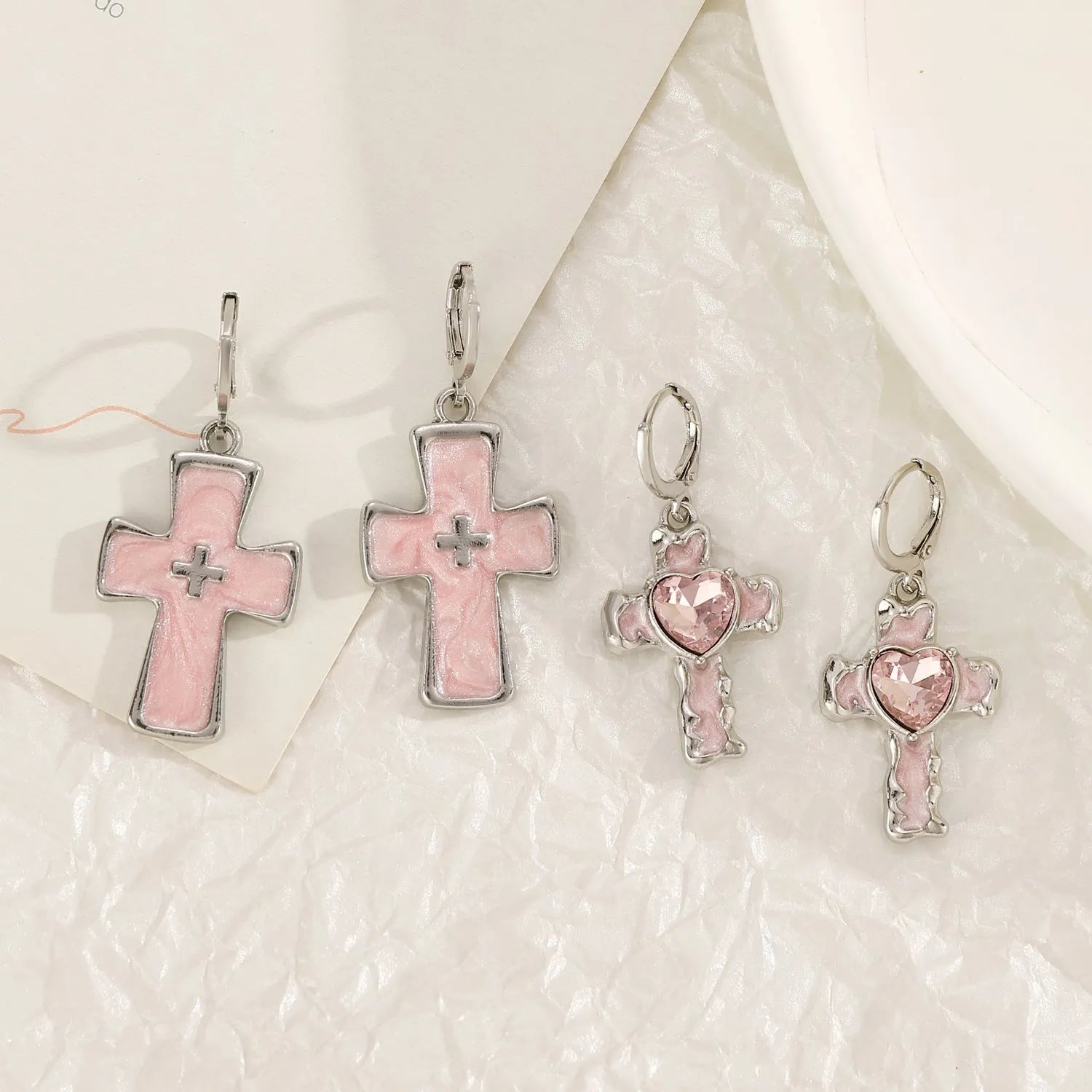 Women's alloy cross crystal earrings in five colour options including white cross and bright black cat designs