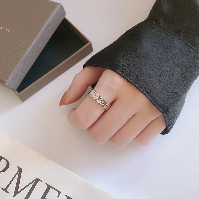 Black geometric copper ring with adjustable opening mechanism for women's fashion jewellery
