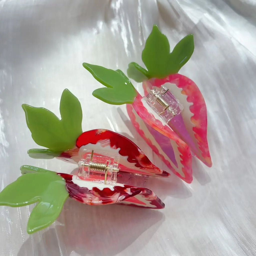 Red handmade strawberry hairpin clip with pastoral style on a white background