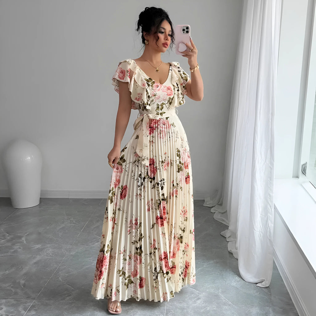 Apricot V-neck floral print dress with ruffled sleeves and an oversized swing skirt.