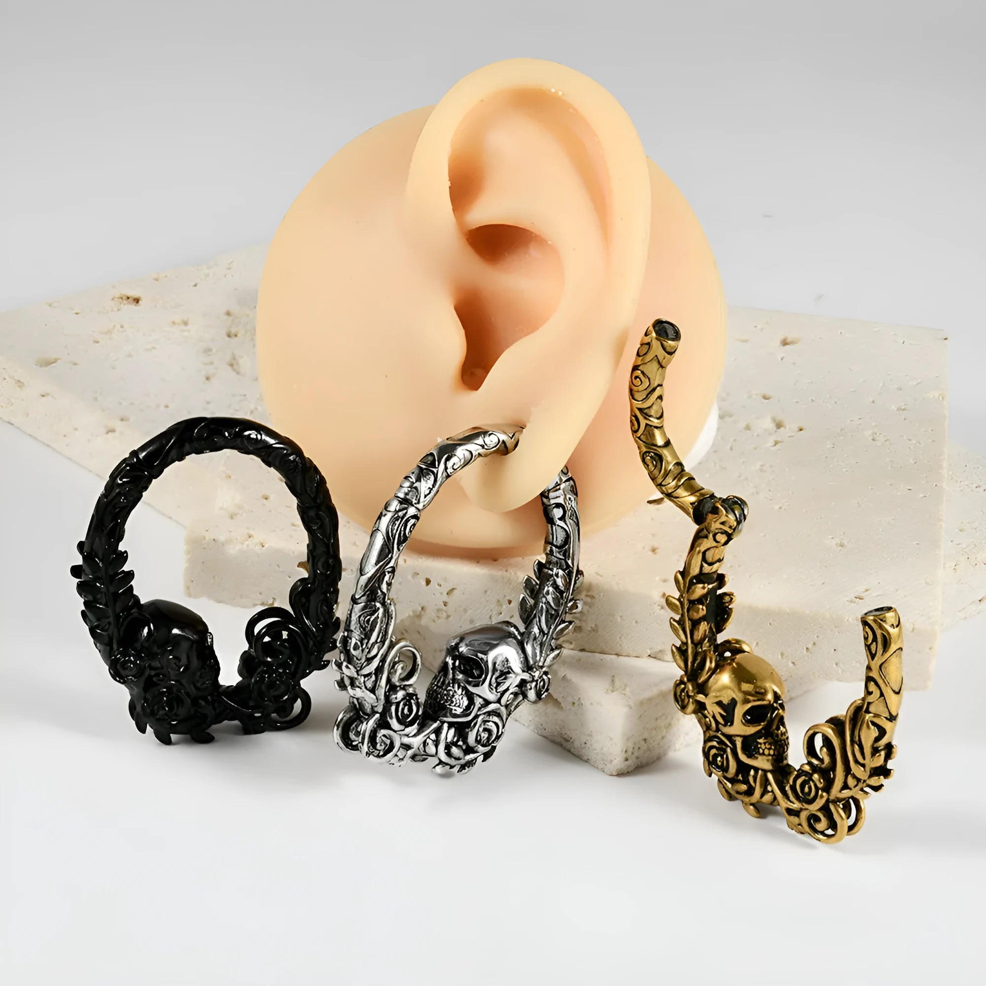 Stainless steel fashion earrings with a totem pattern design in one of 15 electroplated colour options