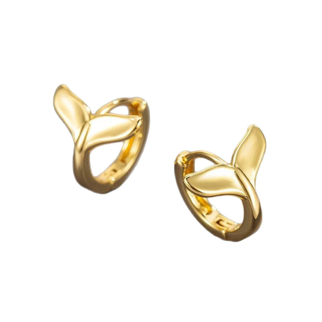 A pair of simple fishtail design earrings with a metallic electroplated finish in either white gold or yellow gold colour.