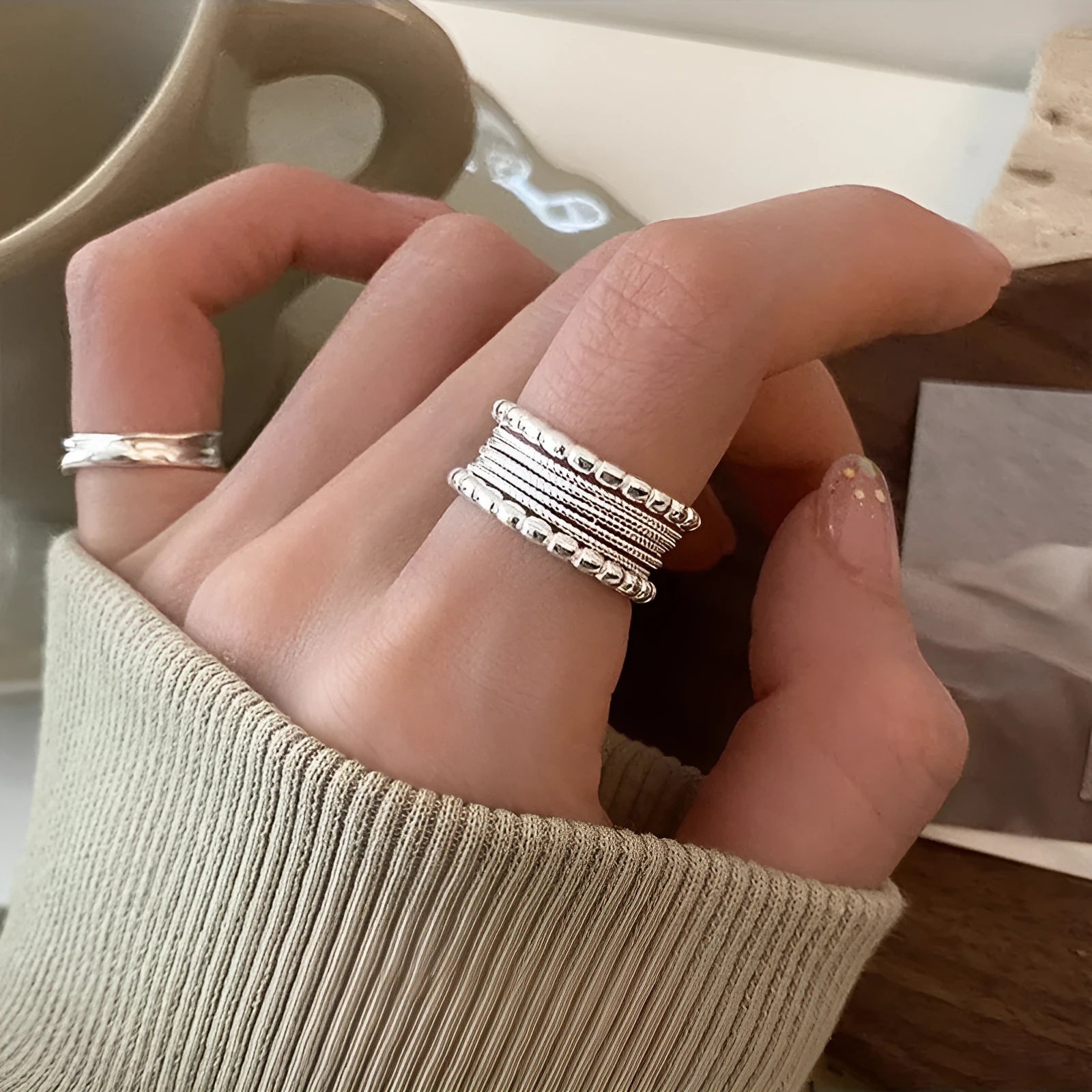 Women's geometric ring with woven twisted multilayer design and adjustable opening